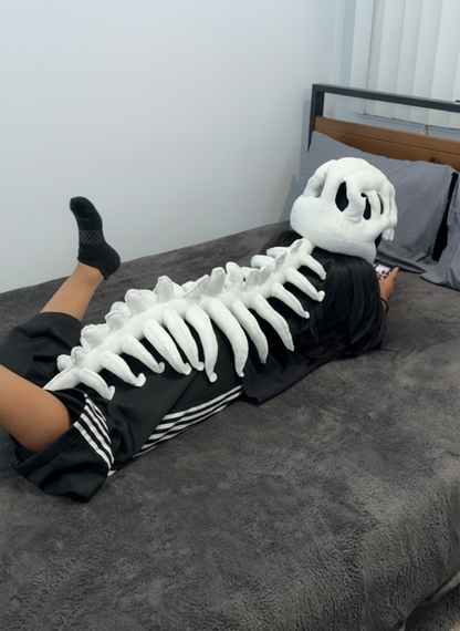 Peluche suave de dinosaurio esquelético DinoHuesitos, felpa ultra suave, vista lateral